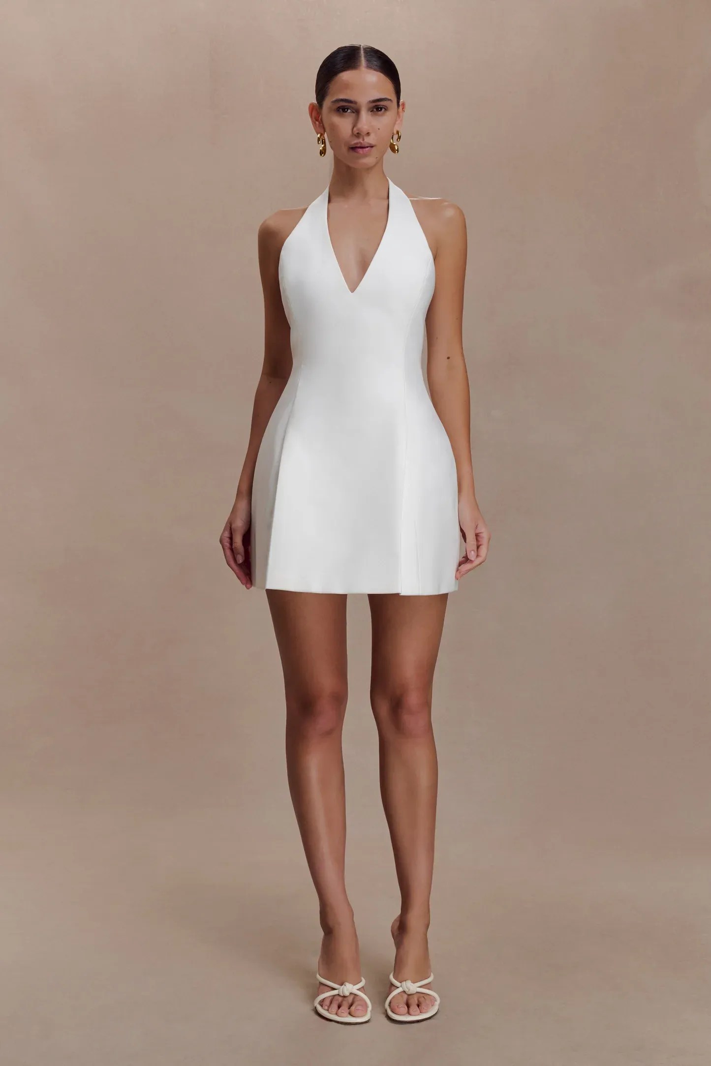 Affordable white halter mini dress for a modern bridal look under £100